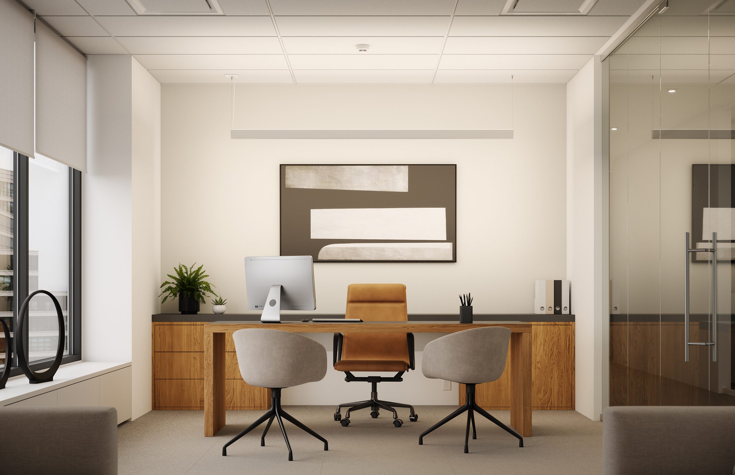 A single Mira pendant lighting a small office