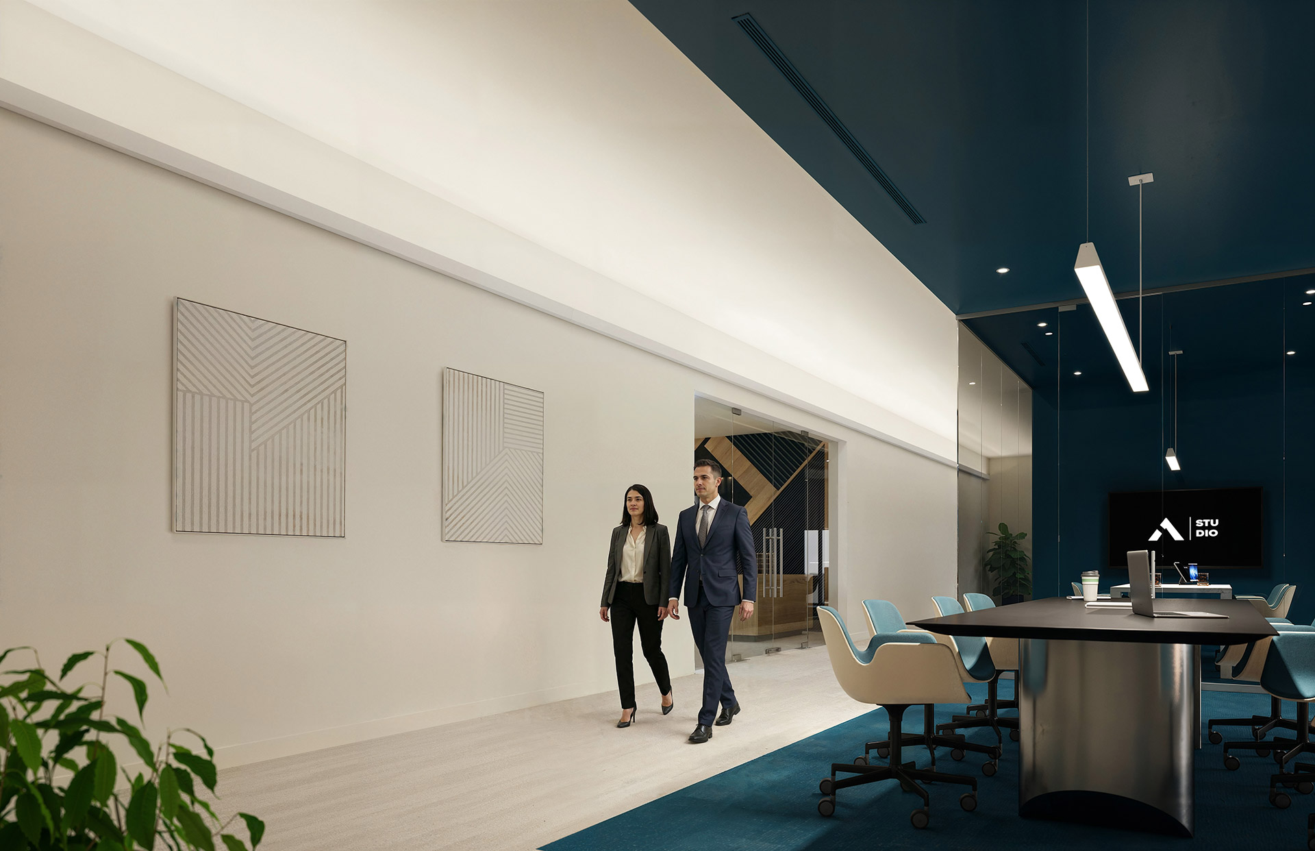 Mira luminaires washing the ceiling of a wide office corridor