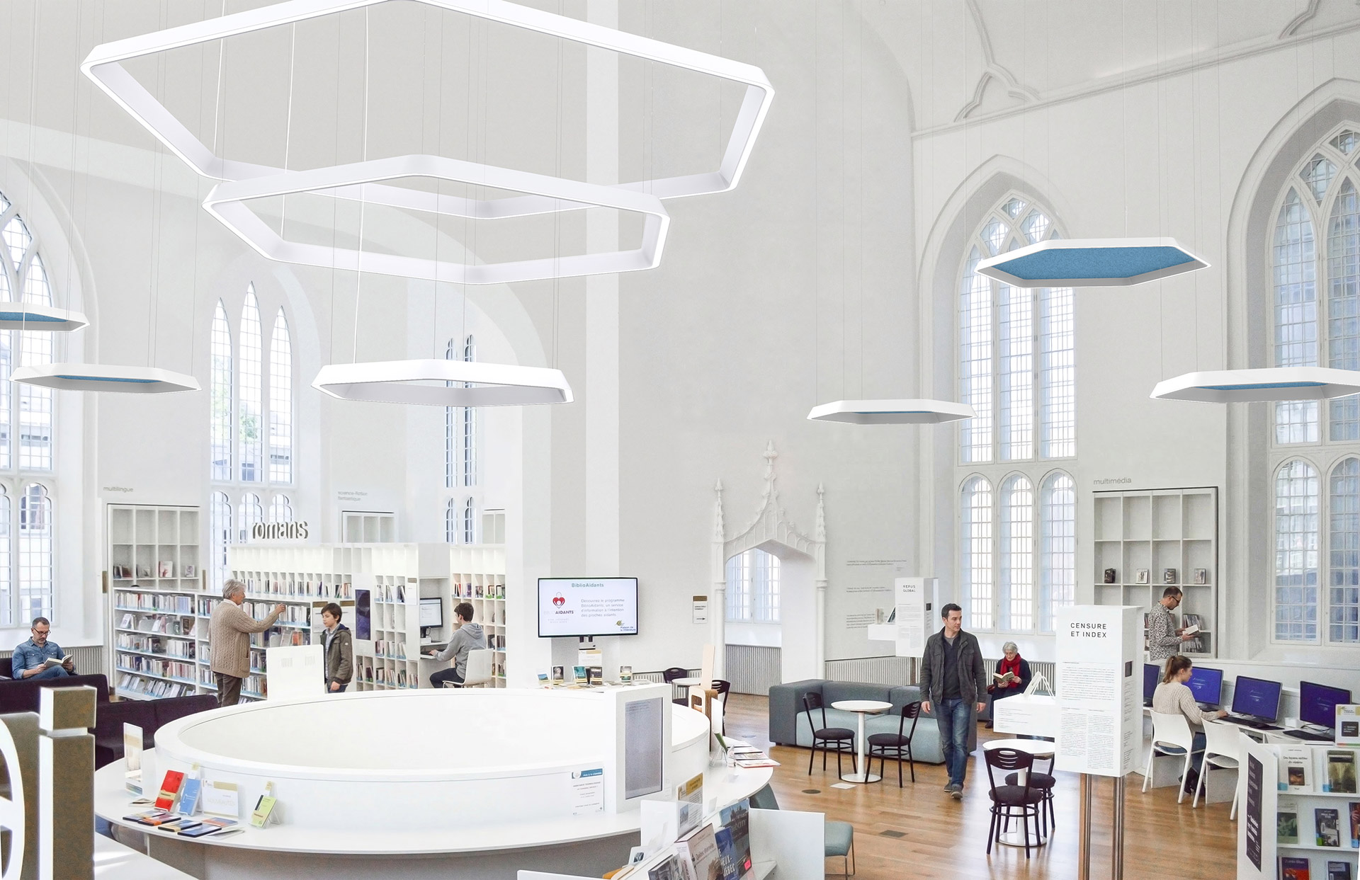 Relay hexagonal luminaires suspended over a public library atrium
